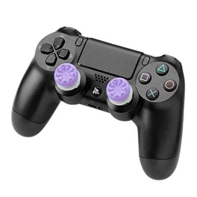 Two black ABS thumb grip extenders for PlayStation 4 controllers, featuring a textured surface for enhanced grip. - Image 2