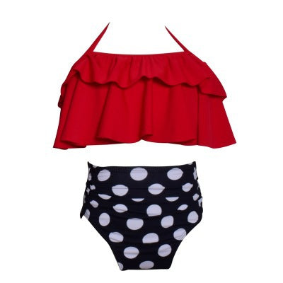 Black wrap bikini top with high-waisted pink and green tropical leaf print swim bottoms. - Image 34