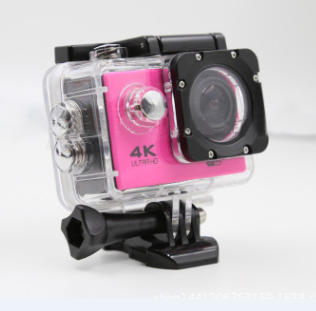 Pink 4K Ultra HD waterproof sport camera in a clear protective case with a black mount adapter. - Image 5