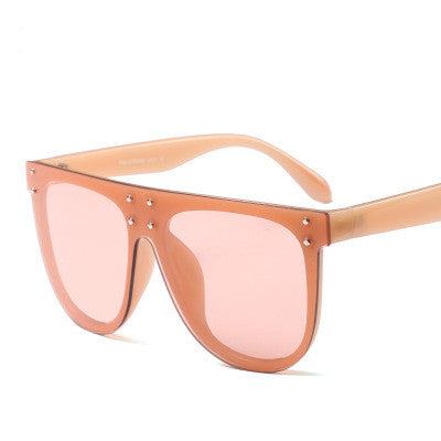 Black and white flat top sunglasses with dark lenses and small gold-toned stud details on the frame. - Image 11