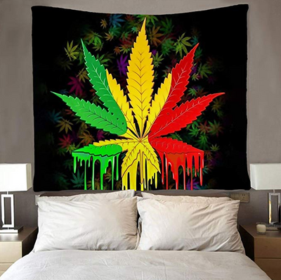 Black tapestry with a large, vibrant green, yellow, and red cannabis leaf design featuring a dripping paint effect. - Image 3