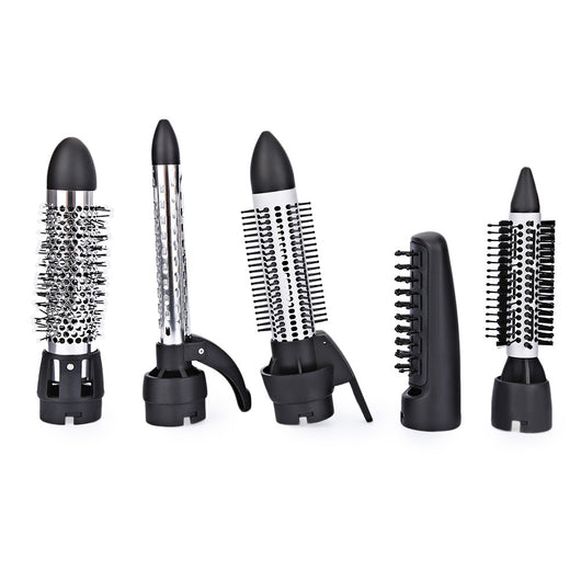 Seven-in-one hair dryer set with white and purple main unit and multiple black styling attachments in an open box. - Image 2