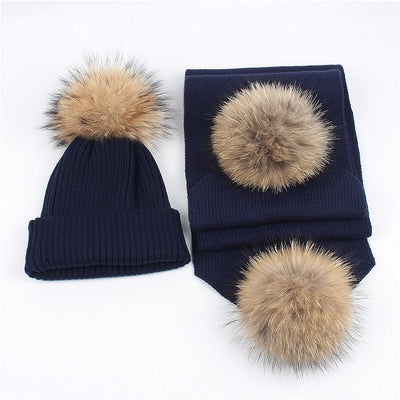 Red knitted hat and scarf set with fluffy brown and black fur pom-poms, ideal for warm winter wear. - Image 10