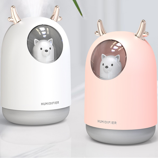 White and pink cute bear mini humidifiers with gold deer antlers, emitting a fine mist.