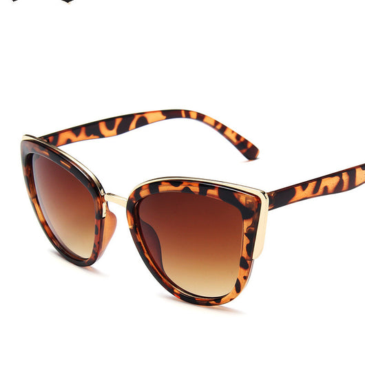 Ladies retro cat eye sunglasses with a tortoiseshell frame, gold accents, and brown gradient lenses. - Image 20
