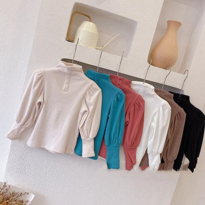 Blusa Infantil con Cuello Alto, Mangas Abullonadas y Botones - Image 11