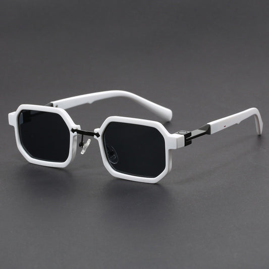 Retro polygon sunglasses for women with a leopard print frame and blue-tinted lenses.