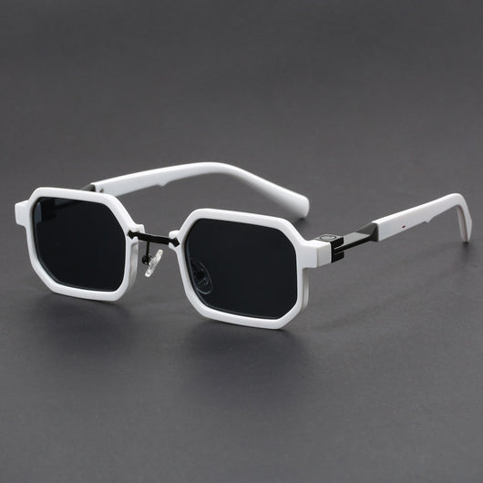 Retro polygon sunglasses for women with a leopard print frame and blue-tinted lenses.