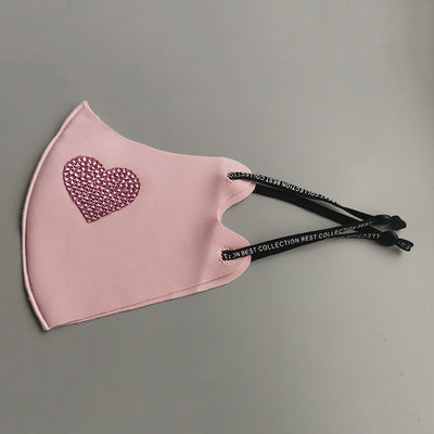 Black ear-mounted mask with a sparkling rhinestone bow pattern, featuring adjustable ear loops. - Image 11