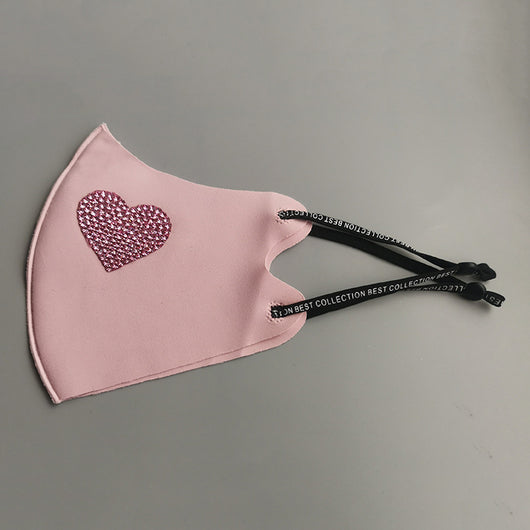 Black ear-mounted mask with a sparkling rhinestone bow pattern, featuring adjustable ear loops. - Image 11