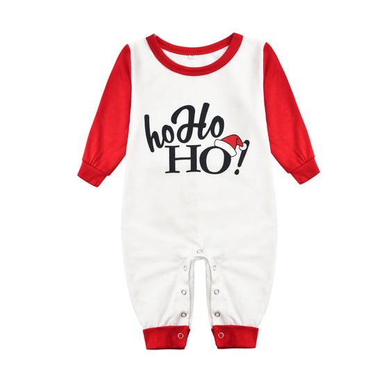 White and red Christmas pajama set with "Ho Ho HO!" text and fair isle patterned pants. - Image 13