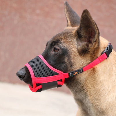 Orange and black adjustable pet muzzle with breathable mesh and a quick-release buckle. - Image 2