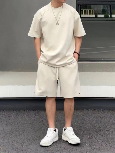 Khaki men's short-sleeved t-shirt and matching shorts set, featuring a loose fit and white drawstring. - Image 9