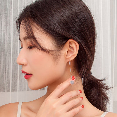 Aretes de Cristal Navideño con Borla - Diseño Copo de Nieve Elegante para Mujer - Image 8
