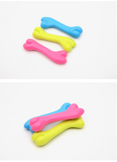 Three colorful rubber bone-shaped chew toys for puppies in pink, yellow, and blue on a white background. - Image 9