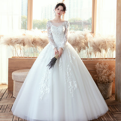 Vestido de Novia con Mangas Largas y Cola Elegante - Image 9