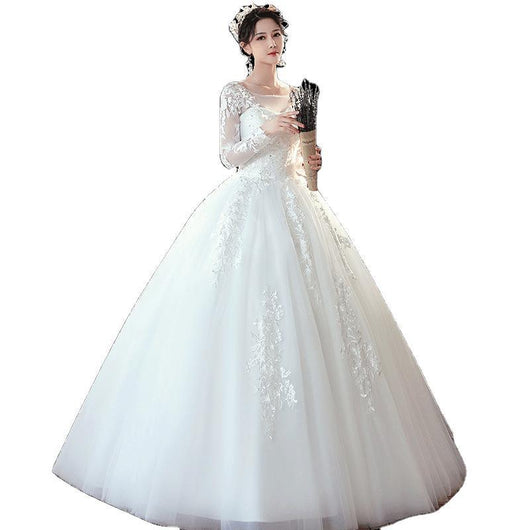 Vestido de Novia con Mangas Largas y Cola Elegante - Image 6