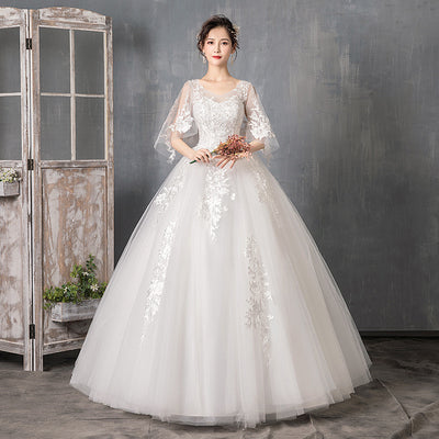 Vestido de Novia con Mangas Largas y Cola Elegante - Image 5
