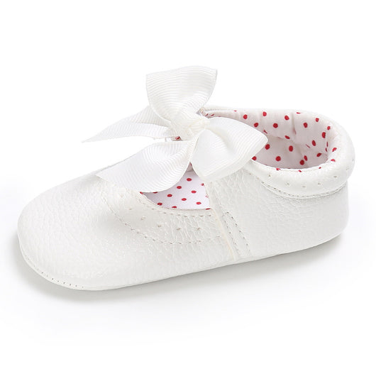 Pink baby soft sole princess shoes with a decorative bow and red polka dot lining, perfect for infants. - Image 3