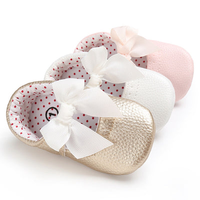 Pink baby soft sole princess shoes with a decorative bow and red polka dot lining, perfect for infants. - Image 4