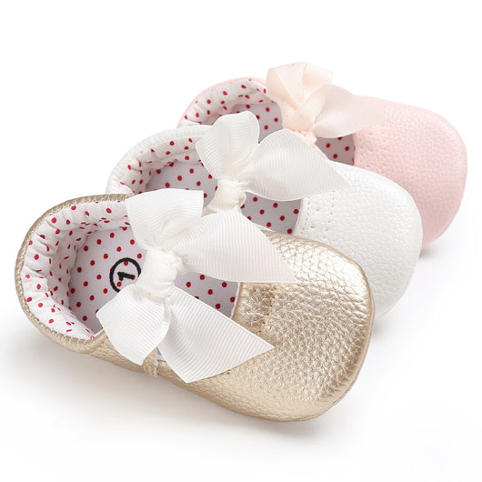 Pink baby soft sole princess shoes with a decorative bow and red polka dot lining, perfect for infants. - Image 4