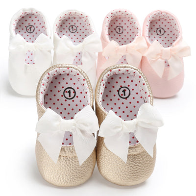 Pink baby soft sole princess shoes with a decorative bow and red polka dot lining, perfect for infants. - Image 5