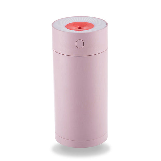 White cylindrical USB desktop humidifier with a mist outlet and a circular control button on top. - Image 6
