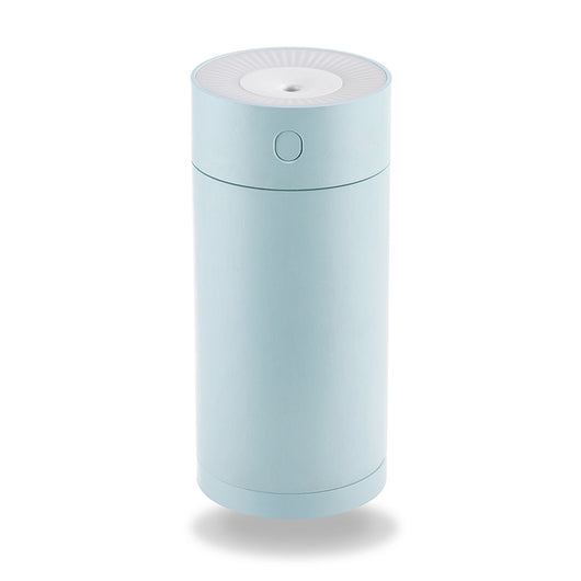 White cylindrical USB desktop humidifier with a mist outlet and a circular control button on top. - Image 5