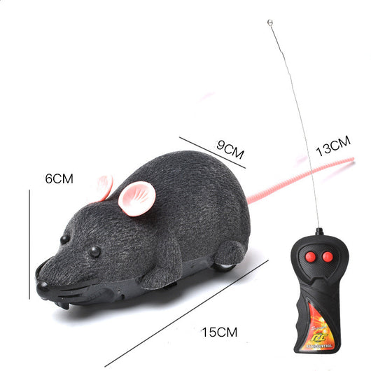 White remote control cat toy mouse with black ears and tail, next to a black remote control with red buttons. - Image 21