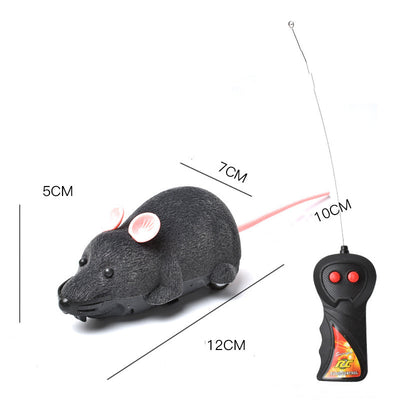 White remote control cat toy mouse with black ears and tail, next to a black remote control with red buttons. - Image 8