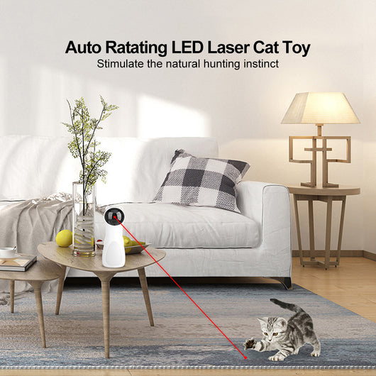 White automatic laser cat toy shaped like a bear, with a black laser projector, next to its product box. - Image 12