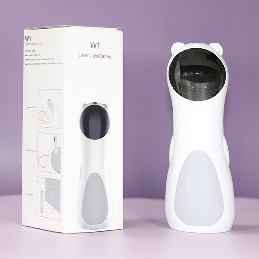 White automatic laser cat toy shaped like a bear, with a black laser projector, next to its product box. - Image 9