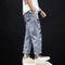 Pantalones Vaqueros Rotos Hombre Joven Estilo Relajado Tendencia Actual