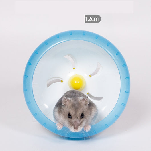 Light brown hamster running in a translucent blue 13cm diameter exercise wheel with a yellow center. - Image 11