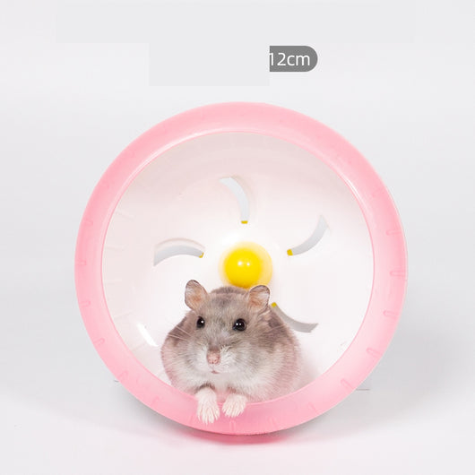 Light brown hamster running in a translucent blue 13cm diameter exercise wheel with a yellow center. - Image 16
