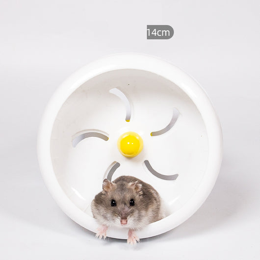 Light brown hamster running in a translucent blue 13cm diameter exercise wheel with a yellow center. - Image 14