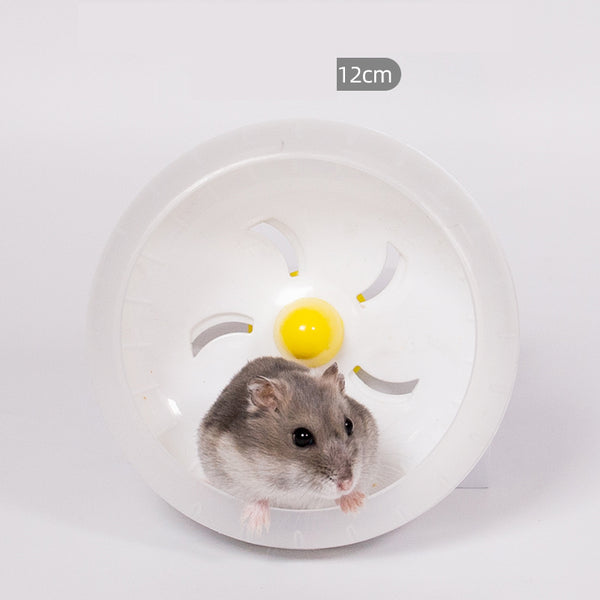 Light brown hamster running in a translucent blue 13cm diameter exercise wheel with a yellow center.