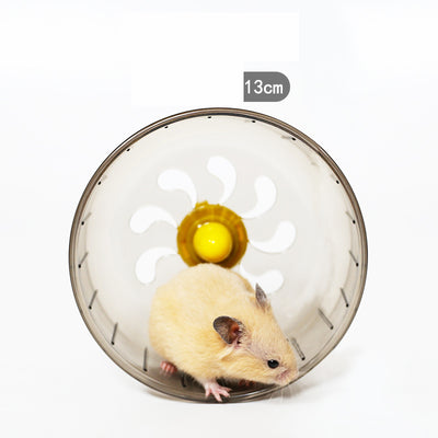 Light brown hamster running in a translucent blue 13cm diameter exercise wheel with a yellow center. - Image 7