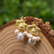 Aretes de Perla de Agua Dulce con Diseño Abeja