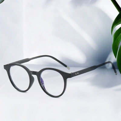 Round tortoise-patterned anti-blue light glasses with clear lenses, shown with a black zippered hard case. - Image 11