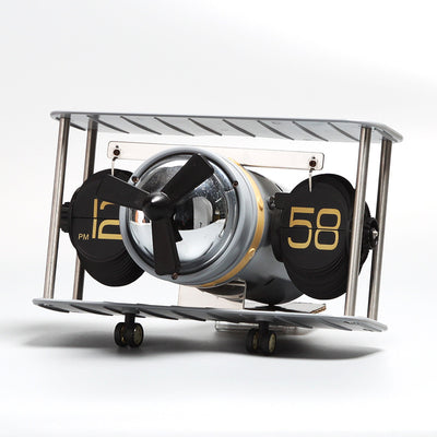 Reloj de Volteo Artístico Estilo Europeo con Modelo de Avión - Image 9