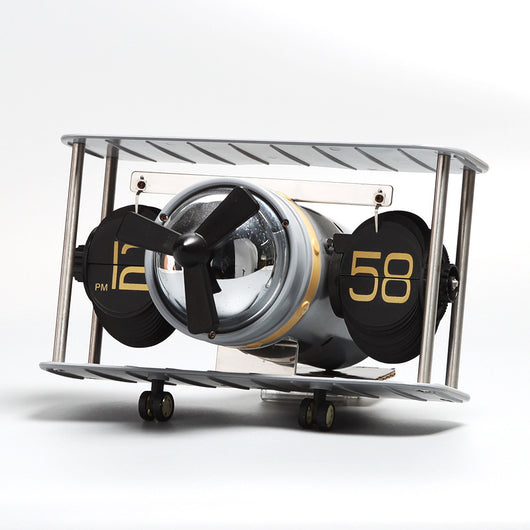 Reloj de Volteo Artístico Estilo Europeo con Modelo de Avión - Image 3