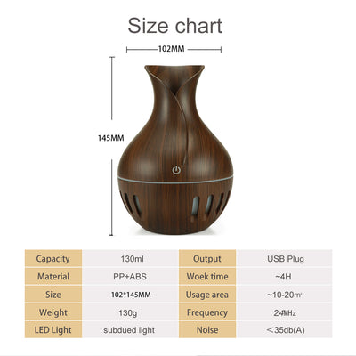 Dark brown wood grain mini USB humidifier with a vase-like shape and a green LED light band and slots. - Image 9