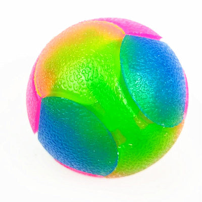 High stretch dog toy ball with a luminous tricolor design, featuring vibrant rainbow colors and a textured surface. - Image 11