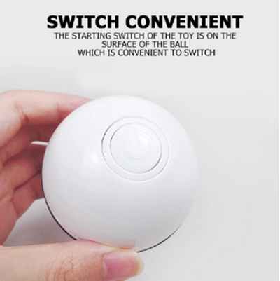 White automatic pet laser ball with a red LED light, held in a hand, designed to attract a cat's attention. - Image 8