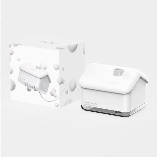 Pink and white house-shaped humidifier and essential oil diffuser with a clear base and a white power cord. - Image 11