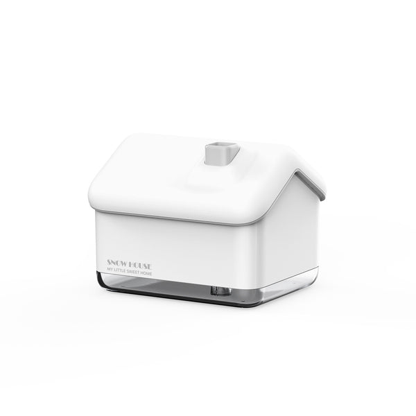 Pink and white house-shaped humidifier and essential oil diffuser with a clear base and a white power cord. - Image 7