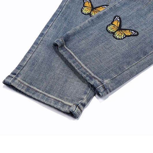 Jeans Slim Fit con Bordado de Mariposas y Detalles Desgastados - Image 14