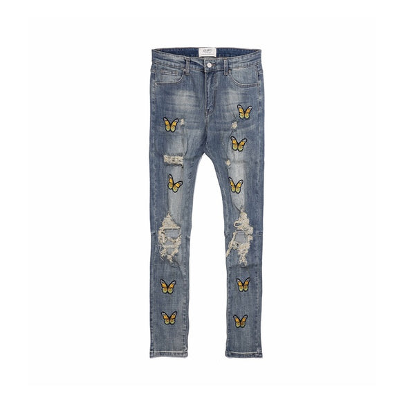 Jeans Slim Fit con Bordado de Mariposas y Detalles Desgastados