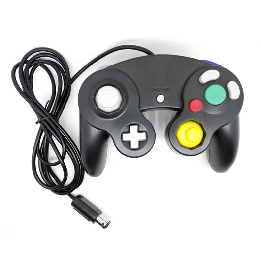 White wired game controller for NGC console with gray D-pad, analog sticks, and colored face buttons. - Image 2
